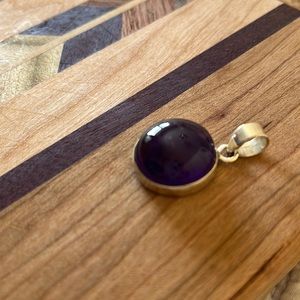 Amethyst circular sterling pendant